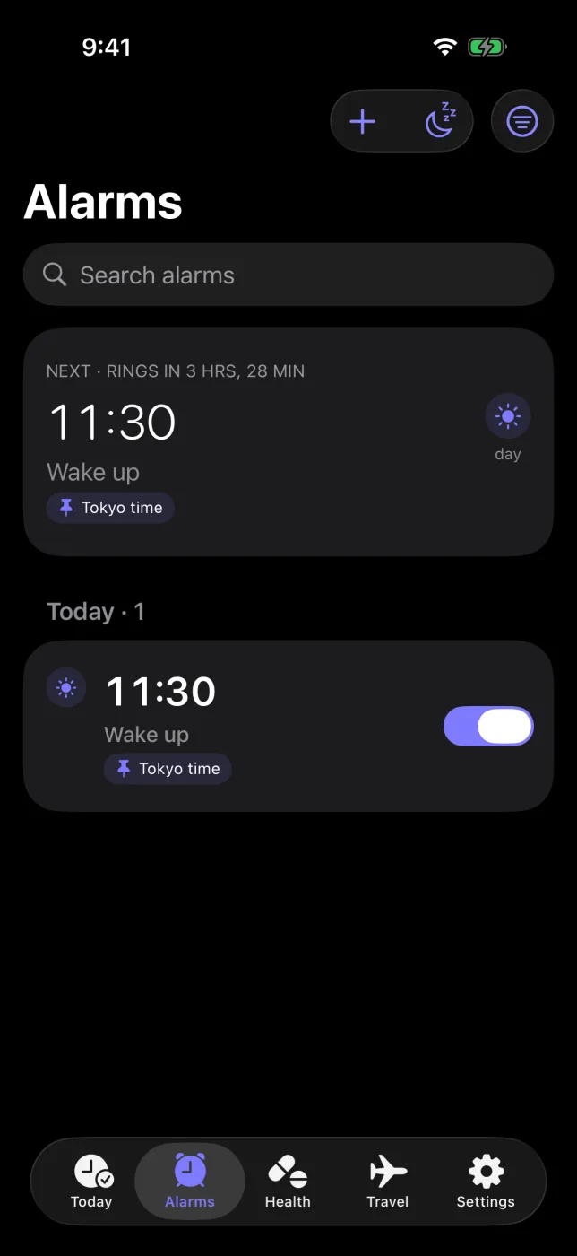 Alarms tab with the next alarm and its city.